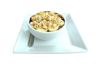 A full bowl of açaí (acai), banana, granola and etc