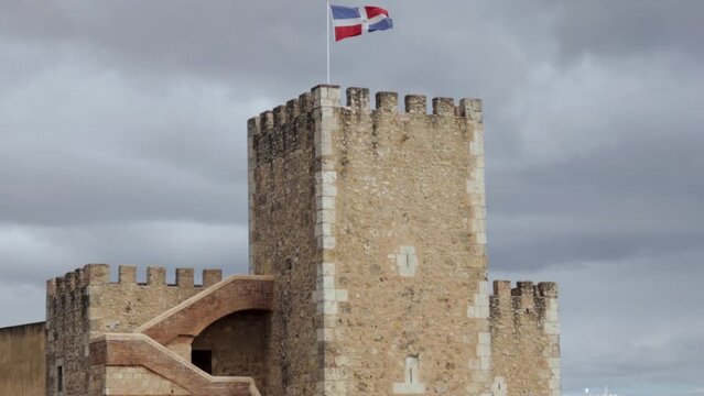 Ozama fortress with Dominican flag waving on top