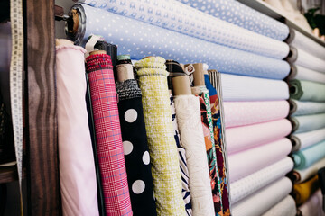 Rolls of fabrics in dressmaker's Atelier. Small business. Nobody. fabrics shop