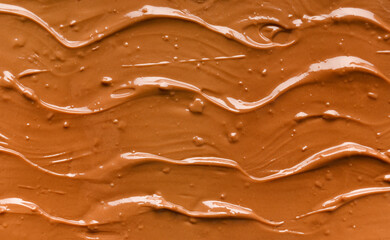 Chocolate background. Melted chocolate. Chocolate swirl.