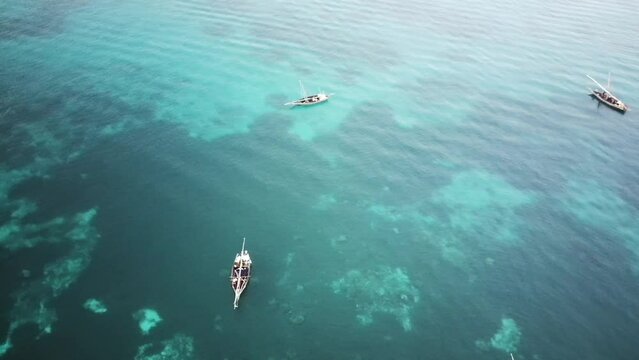 Drone view of fishing on a fishing boat on the coast of Zanzibar.