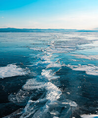 Hummock along a long crack between ice floes on Lake Baikal