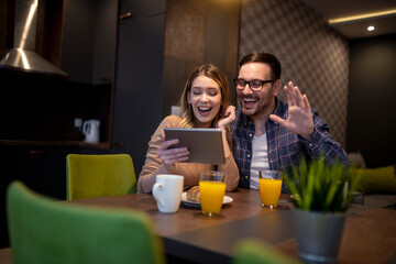 Cute couple enjoying their breakfast together