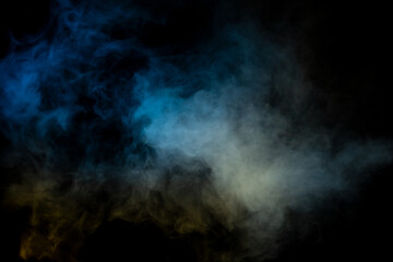 Blue and yellow steam on a black background.