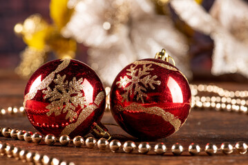 Christmas ornaments, Christmas scene with decorations over rustic wood, dark background, selective...