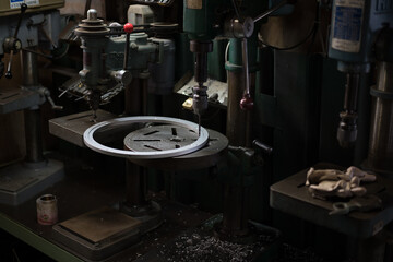 Part machining with drilling machine