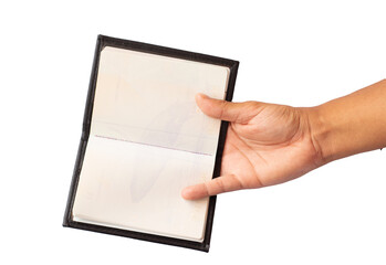 open notebook held by one hand