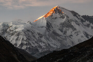 Stunning sunset on Cho Oyu (8188m) in late afternoon. Photo taken from Gokyo village.