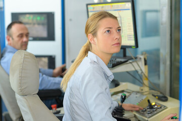 Fototapeta premium factory female worker in control room