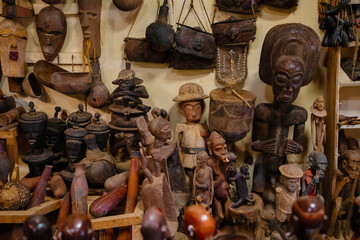 a large exhibition of African masks and figurines made of wood, handmade in the national style