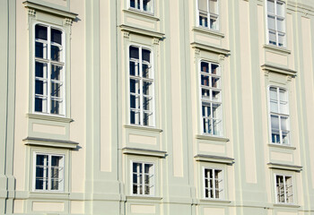 Fototapeta na wymiar Vienna's Historic Yellow Color Building Windows