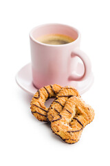 Assorted various cookies and coffee cup. Sweet biscuits isolated on white background.