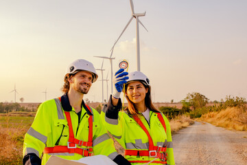 Geographic men and women explorers holding compass find the topography wind farms explore develop...