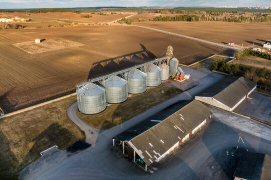 aerial view of agro-industrial complex with silos and grain drying line