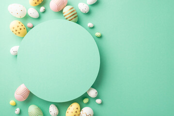 Fototapeta na wymiar Easter celebration concept. Top view photo of turquoise circle and colorful easter eggs on isolated teal background with copyspace