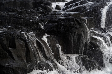 Very big waves and beautiful black rocks the power of the ocean
