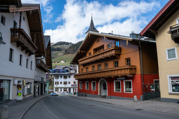 Fototapeta premium Wagrain, Austria - Street with colorful houses in the mountain town of Wagrain.