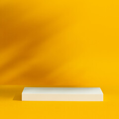 White podium on yellow background with shadows on the wall. Mock up for branding products, presentation and health care.	
