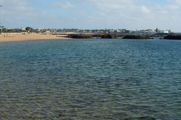 Fototapeta premium Winter vacation in Caleta de Fuste touristic village on Fuerteventura, Canary islands, Spain