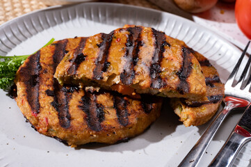 Barbecue grilled tasty vegan and vegetarian burgers made from fresh vegetables and dried legumes and beans