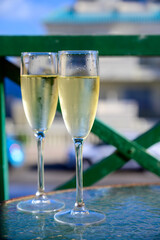 Dinner party, drinking of cava or champagne sparkling wine in vacation resort Caleta Fuste, Fuerteventura, Canary islands vacation, Spain