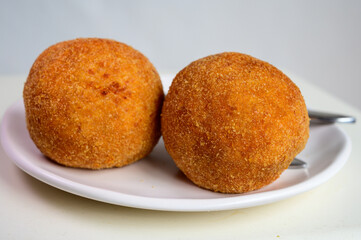 Traditional street food in UK, stuffed fried Scotch eggs with breadcrumbs