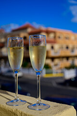 Dinner party, drinking of cava or champagne sparkling wine in vacation resort Caleta Fuste, Fuerteventura, Canary islands vacation, Spain