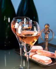 Tasting of rose brut Champagne sparkling wine in cellars of gran cru wine house in Epernay, wine tour in Champagne, France