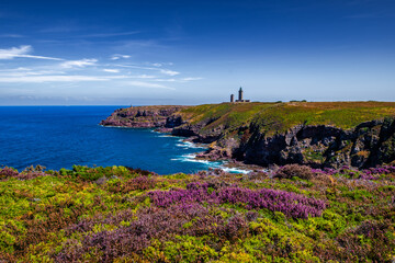 Cliffs At Atlantic Coast With Ancient Lighthouse At Cap Frehel In Brittany, France; Phare du Cap...