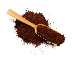 Wooden scoop with coffee powder isolated on white background