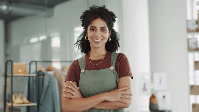 Woman, fashion designer and small business confidence with arms crossed for professional management at workshop. Portrait of happy and confident clothing owner with smile for retail entrepreneurship