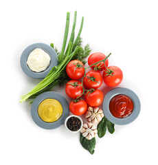 Bowls with different sauces and ingredients isolated on white background