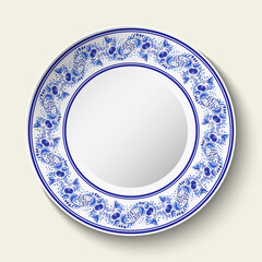 Ornamental porcelain plate with blue ethnic pattern in the style of Chinese painting on porcelain. Decorative Dish isolated on white background.