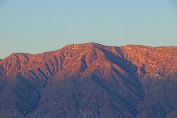 The sun begins to set on a remote valley of the Colorado Desert, near Borrego Springs in San Diego County, California