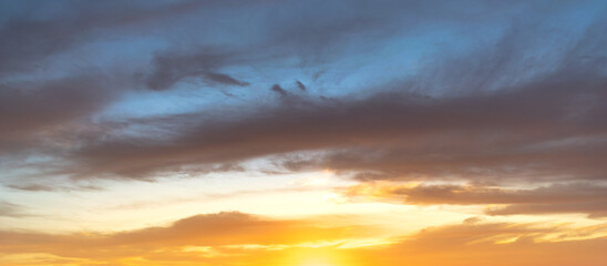 Amazing yellow clouds on a sunse