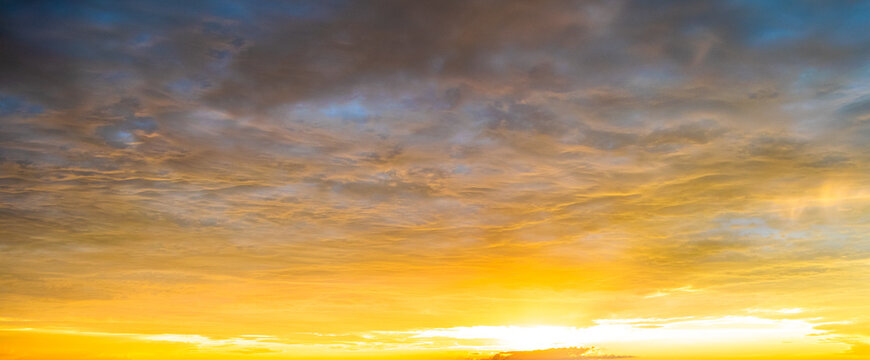 Amazing yellow clouds on a sunse