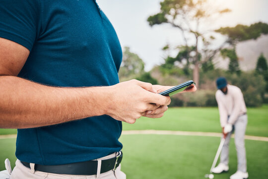 Man, hands and phone texting in communication on golf course for sports, social media or networking outdoors. Hand of sporty male chatting on smartphone or mobile app for golfing research or browsing - Powered by Adobe