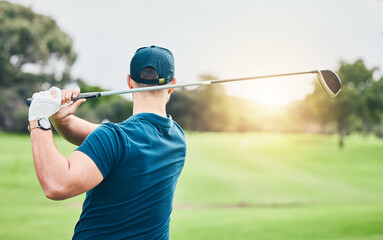 Golf, stroke and back with a sports man swinging a club on a field or course for recreation and...