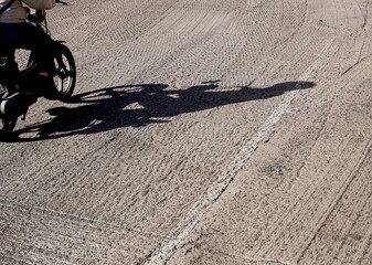 Fototapeta na wymiar A moped on milled asphalt