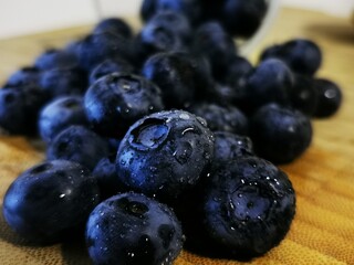 Fresh Blueberry fruits. Drops of water on organic blueberry