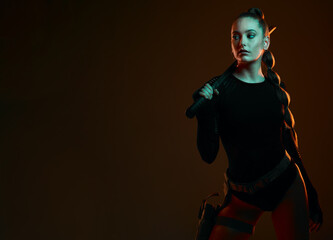 Warrior, woman and sword with space in studio for action, fight and safety from danger. Strong...