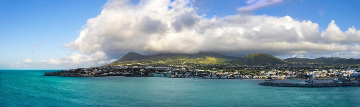 Saint Kitts and Nevis Basseterre scenic panoramic shoreline from cruise ship on Caribbean vacation.