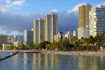 Fototapeta na wymiar High-rise hotels rise above Honolulu's famous Waikiki neighborhood