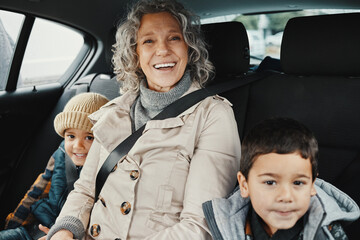 Portrait, road trip and grandmother travel with children or grandchildren and relax on a car ride...