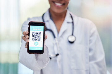 Doctor with QR code for healthcare or covid test results on contactless technology on mobile cellphone online. Hand, smartphone and woman medical or medicine professional with electric registration