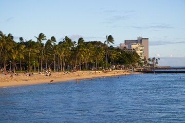 Waves wash up on Queen's Beach, one of the beaches that line the shoreline of Waikiki