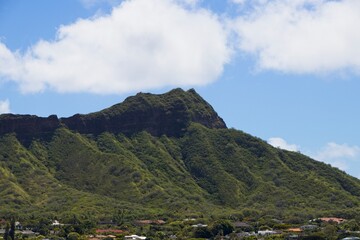 Diamond Head, a volcanic cone, that is a notable landmark visible from Honolulu's famous Waikiki...