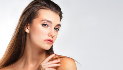 Fototapeta premium Woman, beauty portrait and mockup with makeup, cosmetics and natural skin care aesthetic. Isolated, white background and young female model with mock up for skincare and dermatology in studio