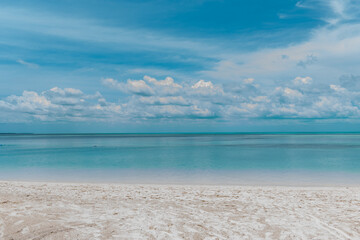 Fototapeta premium beach with blue sky and clouds