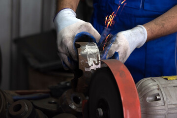 The mechanic was grinding the brake discs and sparks flew out.